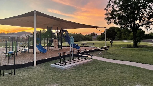 11805 Larch Valley Dr, Austin, TX 78754 - playground at dusk featuring a lawn