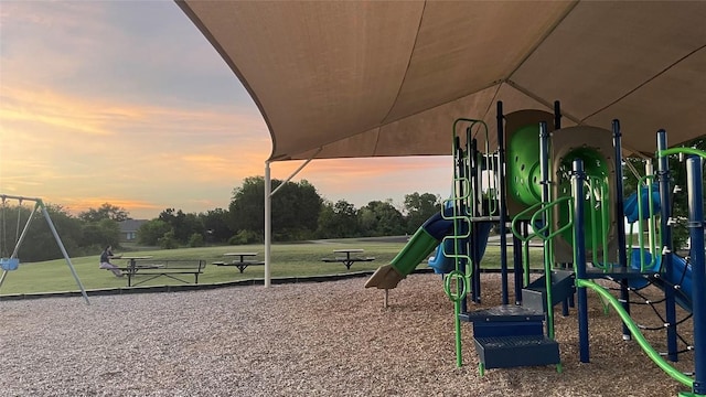 11805 Larch Valley Dr, Austin, TX 78754 - playground at dusk featuring a yard