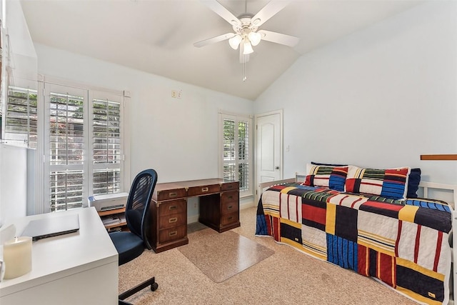 bedroom featuring a ceiling fan, lofted ceiling, and carpet