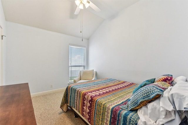 bedroom featuring baseboards, ceiling fan, carpet, and lofted ceiling