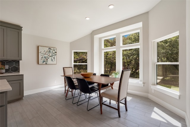 6 Sonata Cir, Wimberley, TX 78676 - dining space with light wood finished floors, recessed lighting, and vaulted ceiling