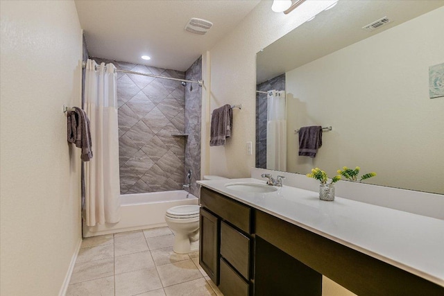 bathroom featuring visible vents, shower / bath combo with shower curtain, toilet, tile patterned floors, and vanity