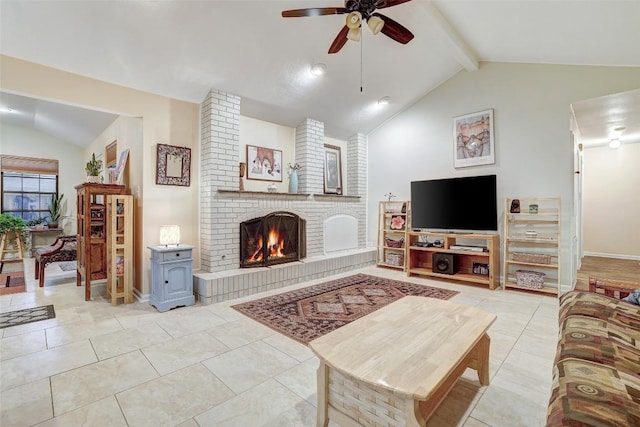 living room with baseboards, light tile patterned flooring, a fireplace, a ceiling fan, and vaulted ceiling with beams