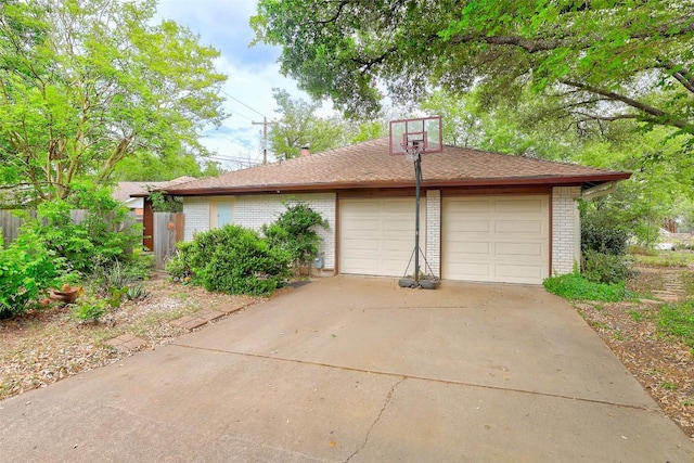 garage with fence