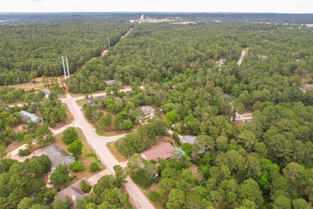 bird's eye view featuring a forest view