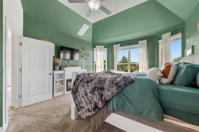 bedroom featuring ceiling fan, carpet, and vaulted ceiling