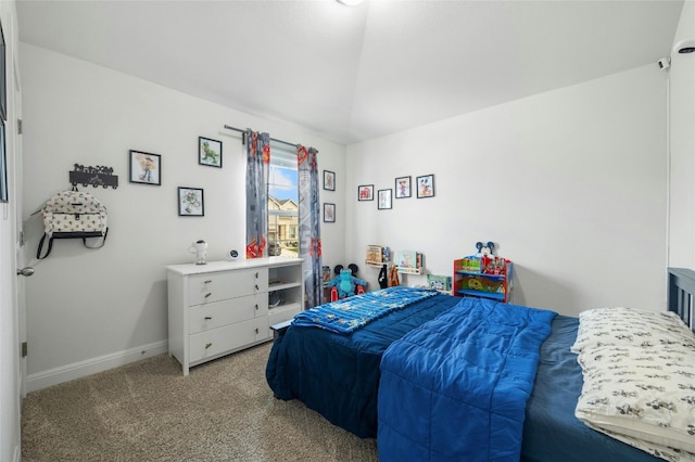 bedroom featuring baseboards and carpet floors