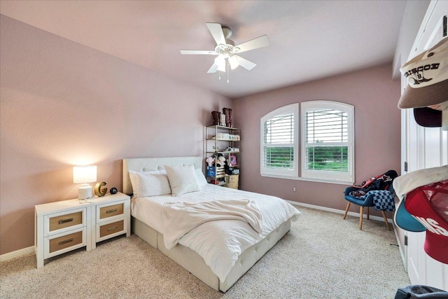 440 Currie Ranch Rd, Wimberley, TX 78676 - bedroom featuring light colored carpet, a ceiling fan, and baseboards