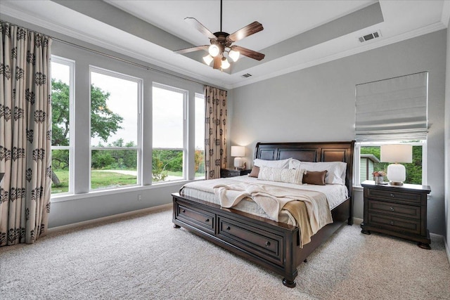 440 Currie Ranch Rd, Wimberley, TX 78676 - bedroom with crown molding, visible vents, and multiple windows