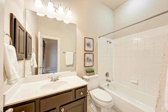 full bathroom featuring toilet, bathtub / shower combination, and vanity