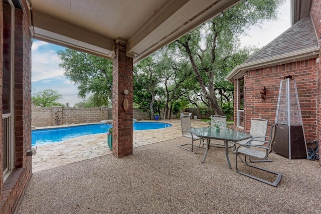 view of swimming pool with a fenced in pool, a patio area, and a fenced backyard
