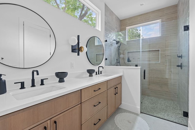 6400 Cannonleague Dr, Austin, TX 78745 - bathroom featuring a stall shower and double vanity