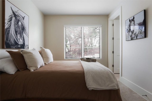 bedroom with baseboards