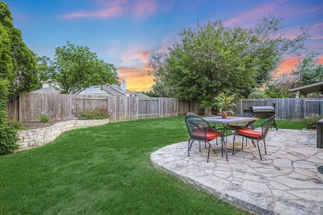 15617 Pumpkin Ridge Dr, Austin, TX 78717 - yard at dusk with a patio and outdoor dining space