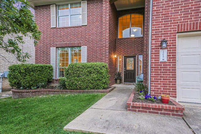 15617 Pumpkin Ridge Dr, Austin, TX 78717 - doorway to property with brick siding and a garage