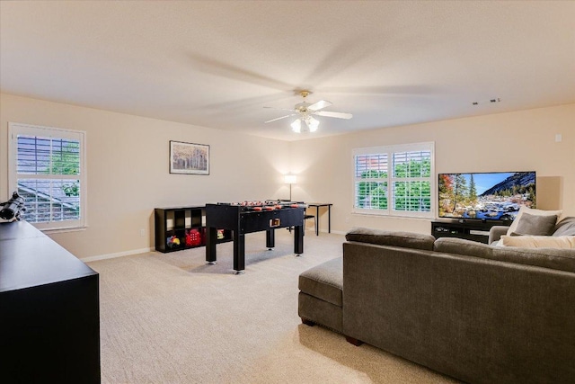 15617 Pumpkin Ridge Dr, Austin, TX 78717 - rec room with light colored carpet, ceiling fan, and baseboards