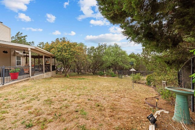 4906 Thunderbird Dr, Lago Vista, TX 78645 - view of yard with a ceiling fan and a patio