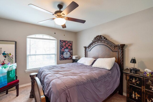 4906 Thunderbird Dr, Lago Vista, TX 78645 - carpeted bedroom featuring multiple windows and a ceiling fan