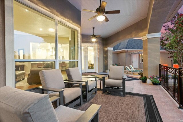 view of patio featuring a ceiling fan