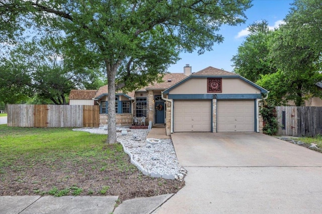 single story home featuring a chimney, fence, driveway, and an attached garage