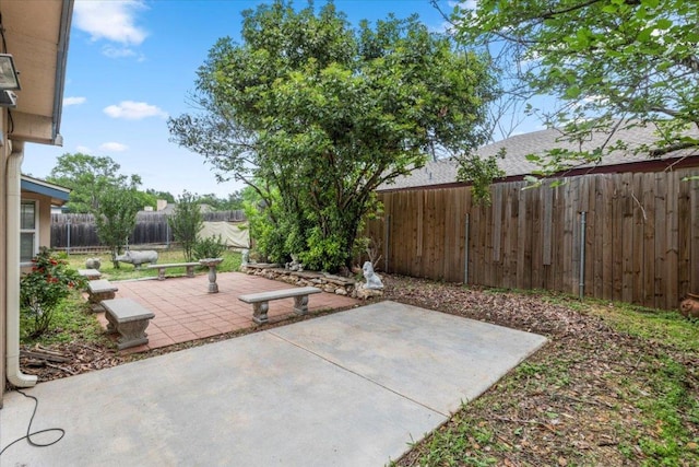 view of patio with a fenced backyard