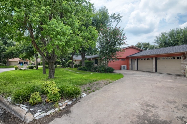 3005 Crystal Cir, Taylor, TX 76574 - single story home with a garage, driveway, and a front lawn
