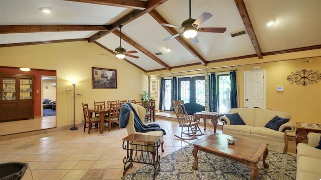 living area with light tile patterned flooring, a ceiling fan, visible vents, and vaulted ceiling with beams