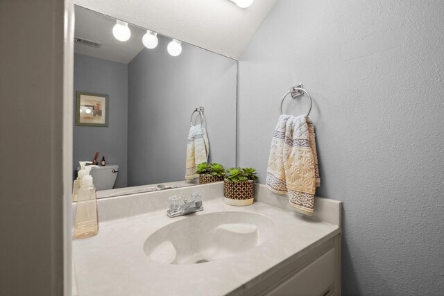 1904 Goodrich Ave Unit 16, Austin, TX 78704 - bathroom featuring vanity and toilet