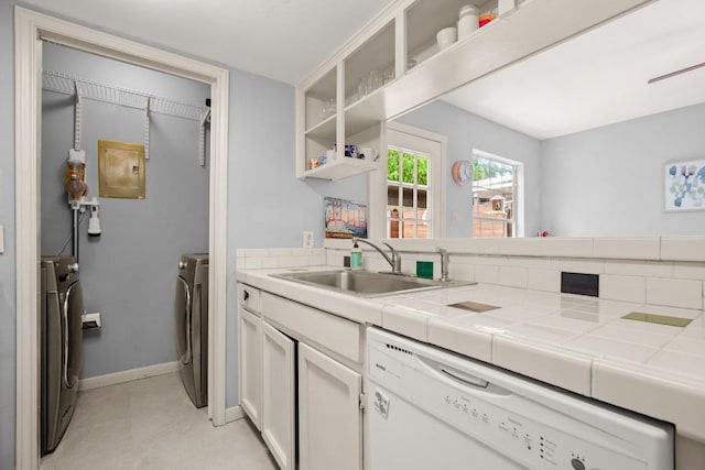 1904 Goodrich Ave Unit 16, Austin, TX 78704 - kitchen featuring dishwasher, a sink, tile countertops, open shelves, and white cabinetry