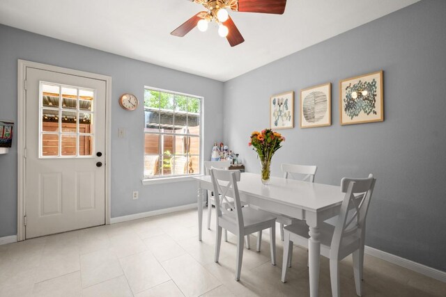 1904 Goodrich Ave Unit 16, Austin, TX 78704 - dining room featuring a ceiling fan and baseboards