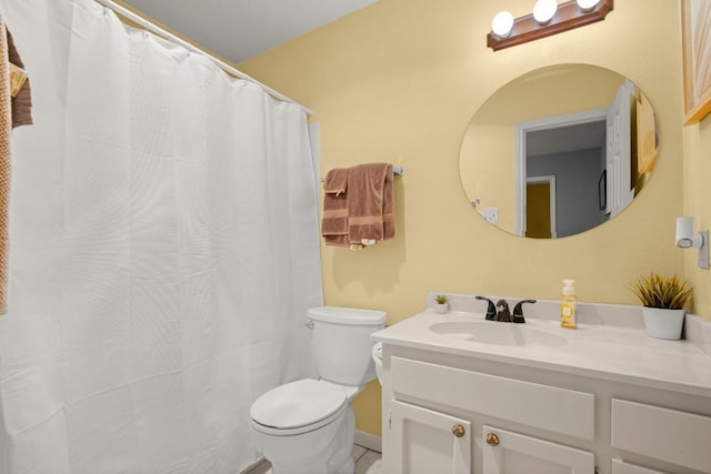 1904 Goodrich Ave Unit 16, Austin, TX 78704 - bathroom featuring vanity, toilet, and a shower with shower curtain