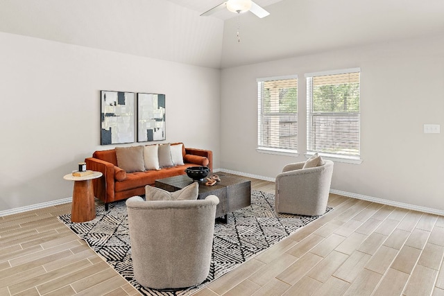 135 Hackberry Ln, Bastrop, TX 78602 - living area featuring ceiling fan, light wood finished floors, and baseboards