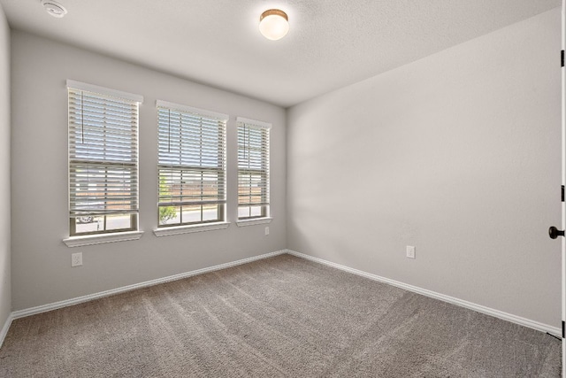 135 Hackberry Ln, Bastrop, TX 78602 - carpeted spare room with baseboards