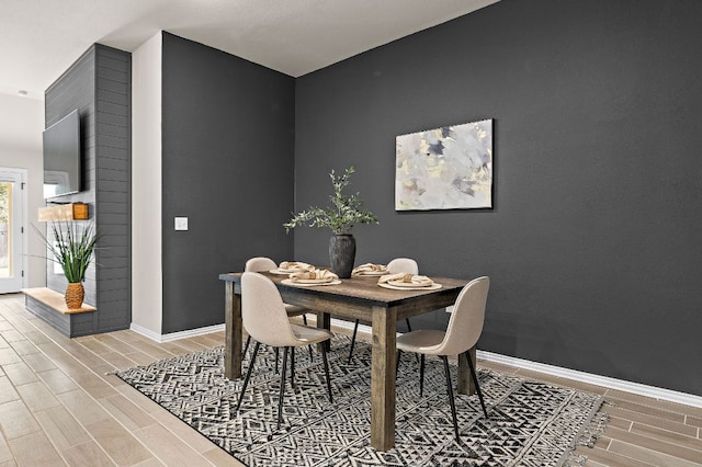 135 Hackberry Ln, Bastrop, TX 78602 - dining room featuring wood finish floors and baseboards