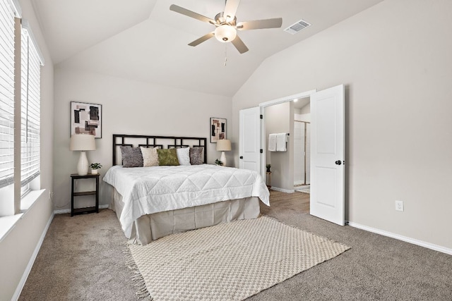 135 Hackberry Ln, Bastrop, TX 78602 - bedroom with vaulted ceiling, carpet floors, baseboards, and ceiling fan