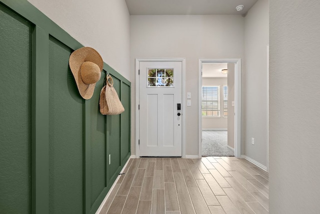 135 Hackberry Ln, Bastrop, TX 78602 - entryway with baseboards and light wood-type flooring