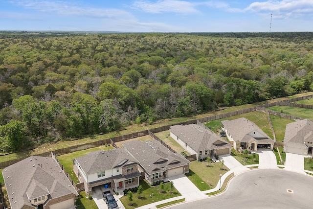 135 Hackberry Ln, Bastrop, TX 78602 - drone / aerial view featuring a residential view and a forest view