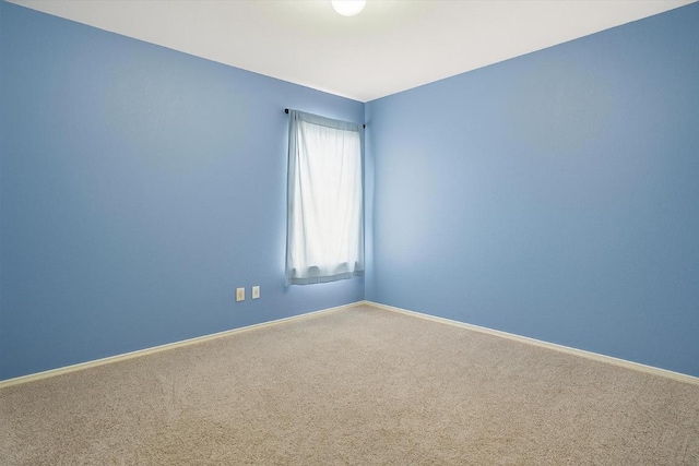 1516 Gunnison Cv, Lockhart, TX 78644 - empty room with carpet and baseboards