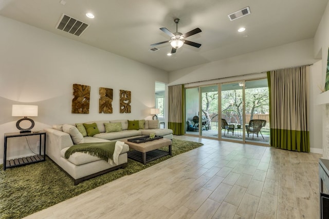 2724 Rain Song Dr, Leander, TX 78641 - living area featuring ceiling fan, wood finished floors, and recessed lighting