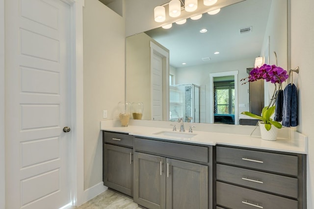 2724 Rain Song Dr, Leander, TX 78641 - full bath featuring a shower stall, vanity, and recessed lighting