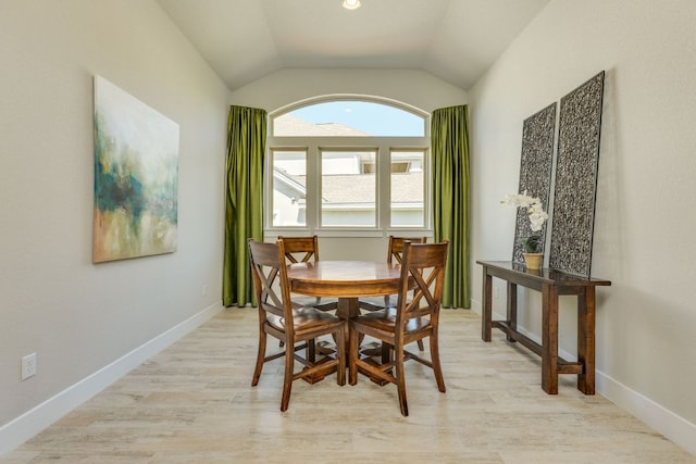 2724 Rain Song Dr, Leander, TX 78641 - dining space featuring lofted ceiling and light wood-style floors