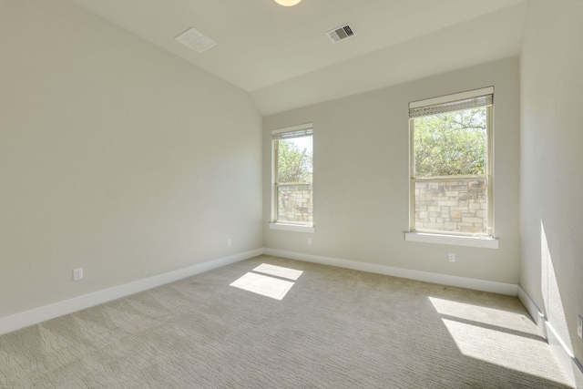 2724 Rain Song Dr, Leander, TX 78641 - spare room with carpet floors and lofted ceiling