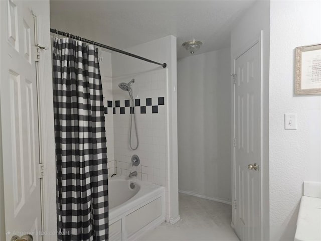 full bathroom featuring tile patterned flooring and shower / tub combo with curtain