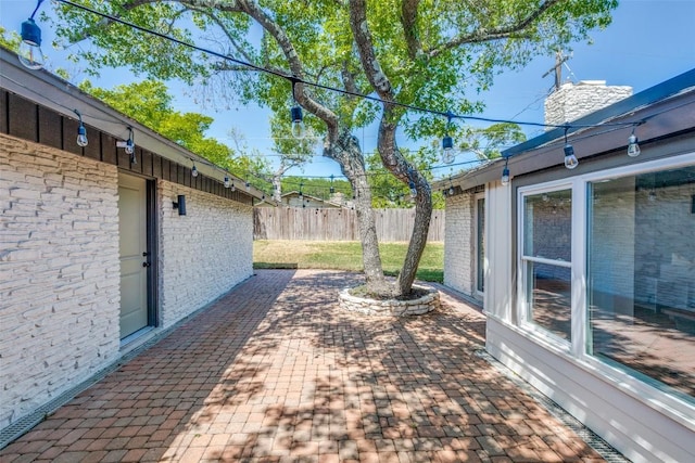 view of patio / terrace with fence
