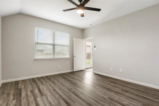 unfurnished room with wood finished floors, a ceiling fan, and baseboards