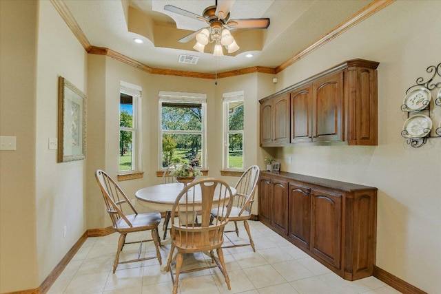 dining area featuring crown molding, visible vents, and baseboards