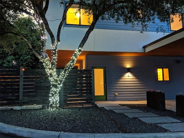 view of front of home with fence