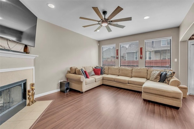 3306 Castleton Dr, Killeen, TX 76542 - living room with ceiling fan, baseboards, recessed lighting, a fireplace, and wood finished floors