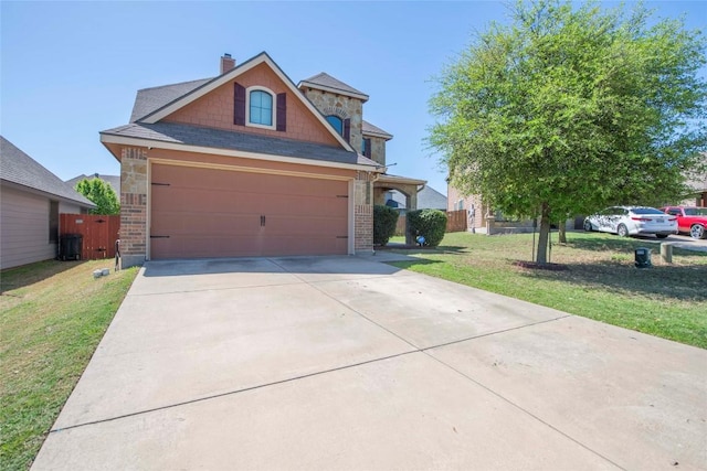 3306 Castleton Dr, Killeen, TX 76542 - view of front of home with concrete driveway, a chimney, a front yard, and fence