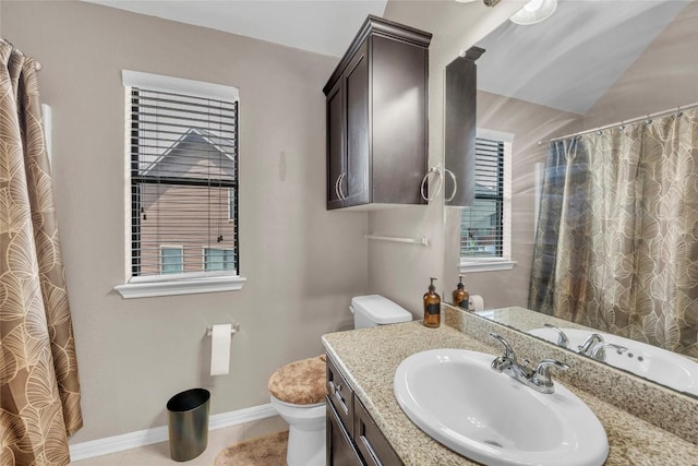 3306 Castleton Dr, Killeen, TX 76542 - full bathroom with vanity, toilet, and curtained shower